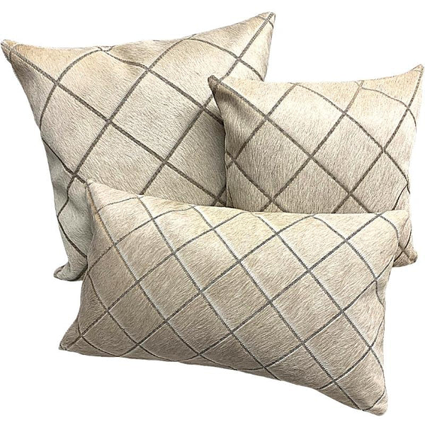 Our Natural Champagne Cowhide Diamond Laser Cut Throw Pillows are created by hand and include premium duck feather inserts. Each pillow is hand finished with an extra strong lining along with American made YKK zippers. They are available in 3 sizes, 18” square, 22” square and 22”x13” lumbar.
