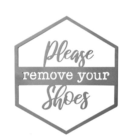 Our Please Remove Your Shoes Metal Door or Wall Greeting Quote Sign add expression to your indoor or outdoor space. These, made to last and endure, charming hexagon signs are made here in the USA, from premium made raw unsealed steel. They are available in 9 styles, each of which has a short sayings that will be inspiration and fun to greeting folks in your home, indoors or outdoors. Size is 14” x 12”.