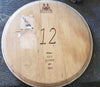 Sample of Reclaimed Wine Barrel Head Wood Lazy Susan with Winemakers Stamp before it is cleaned up and repurposed