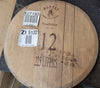 Sample of Reclaimed Wine Barrel Head Wood Lazy Susan with Winemakers Stamp before it is cleaned up and repurposed