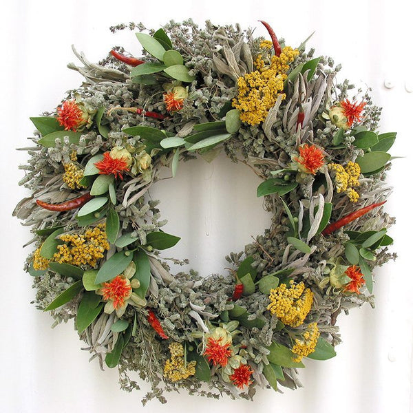 This handcrafted Safflower and Herb Natural Dried and Preserved Wreath  is 16" in diameter with herbs grown in the USA