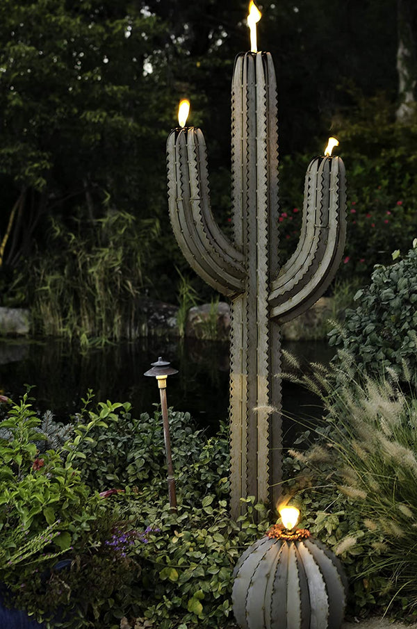 Shown is our Saguaro Cactus Metal Tiki Torch Yard Art Sculpture all lit up for a beautiful evening for enjoyments in your garden or on your patio. Available in 2 sizes 5’ tall or 6.5’ tall. 