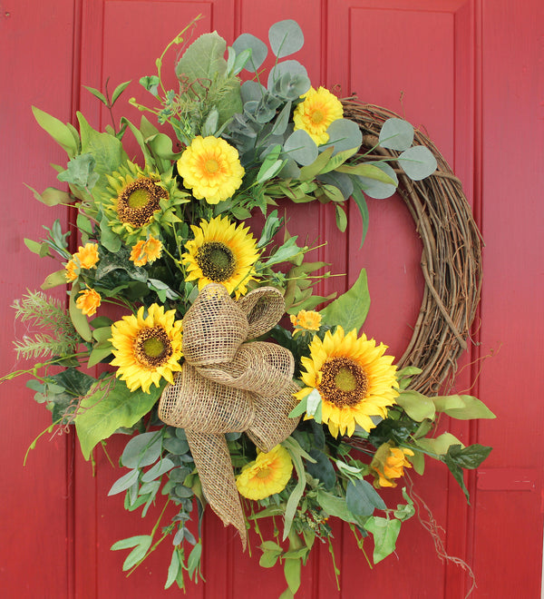 Our Sensational Sunflowers Grapevine and Silk Front Door Wreath – 22” is colorful and great for many seasons of color