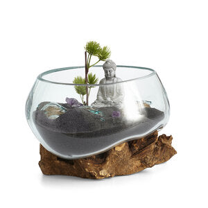 Our Small Hand Blown Molten Glass and Wood Root Sculptured Succulent Bowl Terrarium (7”x7”) is shown with a succulent garden and contents are not included
