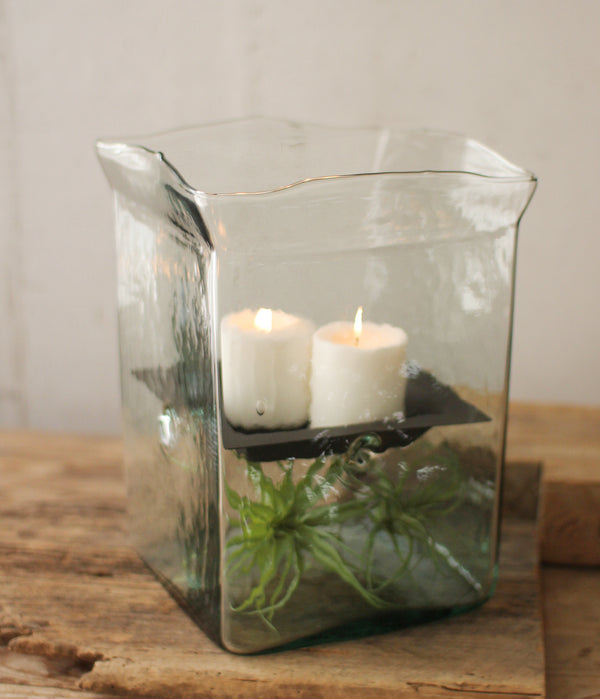 This Extra Large Square Recycled Glass Hurricane Fillable Candle Holder Vase Terrarium is a multi-functional piece that can be used as a terrarium, candle holder or both at the same time.