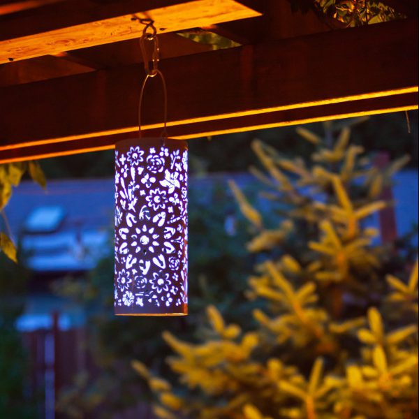 Our Midnight Blue Punched Metal Solar Lantern can be hung or added to a flat surface to reflect its the beauty of the cutouts