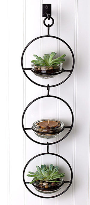 Our Triple  Metal and Glass Hanging Wall Terrarium / Candle Holder / Bird Feeder is a multi-functional item and can be used indoors or outdoors