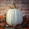  Our White Metal Indoor/Outdoor Pumpkin Candle Luminary is 18” tall x 12” in diameter and has a large 6” opening for you to add your own flameless candle or 3-wick jar candle and you will immediately light up any space day or night. Our steel construction pumpkins are rust-proof, powder coated, UV resistant and so great for creating indoor or outdoor beauty, season after season. Also available in orange and expresso colors. 